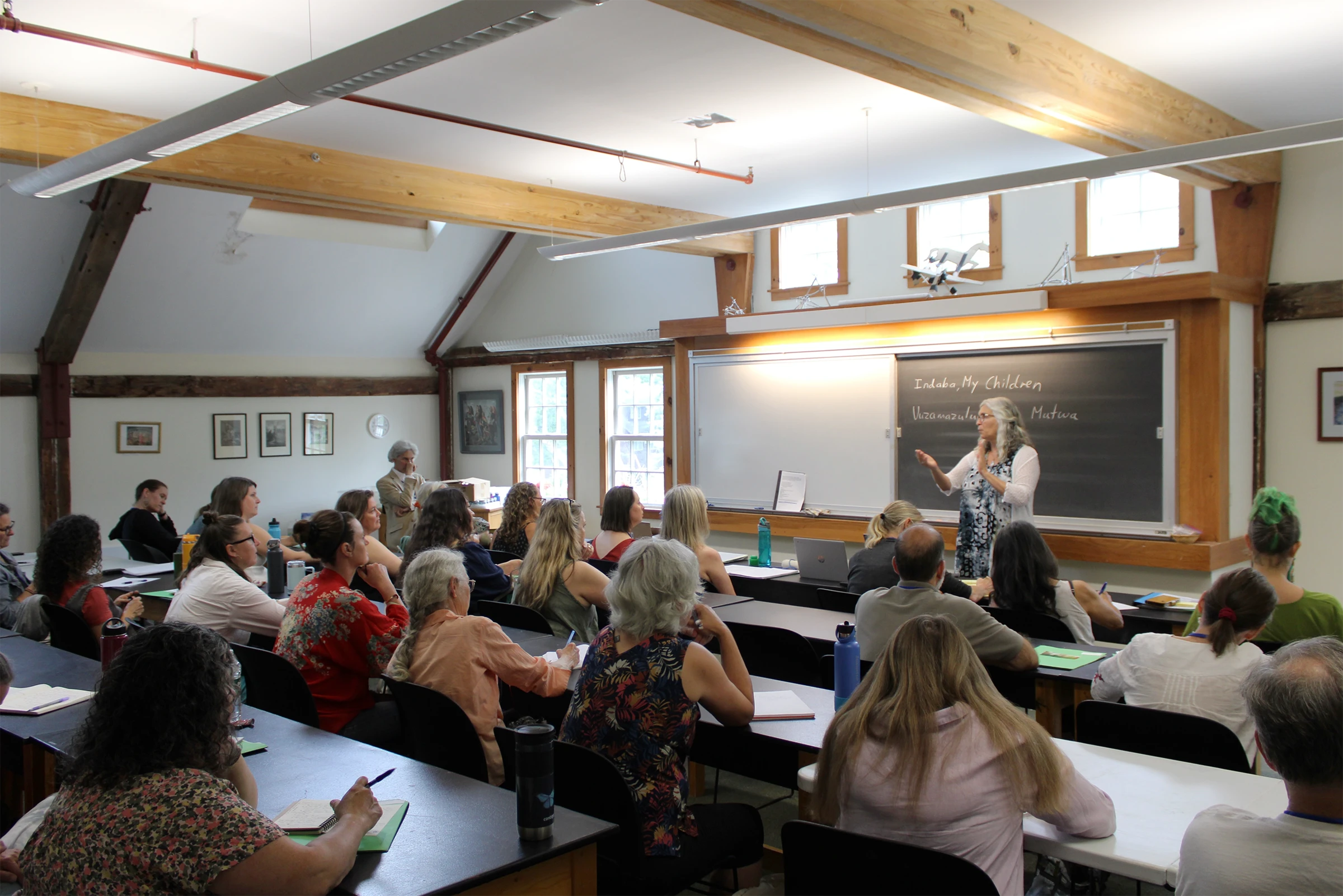 Adult students in a timber-framed classroom during a Center for Anthroposophy course