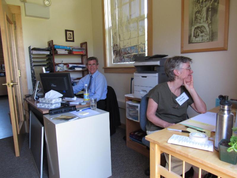 Milan Daler (left), Cfa Administrator, and his assistant MaryLyn Yonika (right) are responsible for processing applications for Foundations Studies under the watchful eye of Rudolf Steiner (above!).